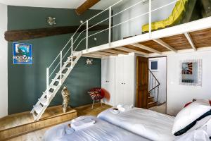Appartements Le Patio Carreterie - Maison chaleureuse avec Jacuzzi Exterieur Privatif - Primee pour sa deco : photos des chambres