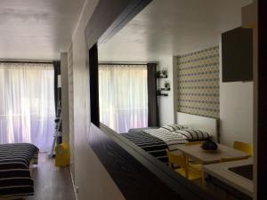 Appartements Studio Couleur Soleil : photos des chambres