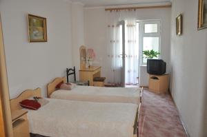 Double or Twin Room with Balcony room in Guest House on Pionerskaya
