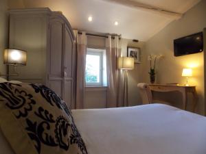 Hotels Hostellerie Le Roy Soleil : photos des chambres