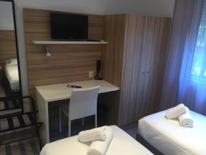 Hotels L'Oasis : photos des chambres