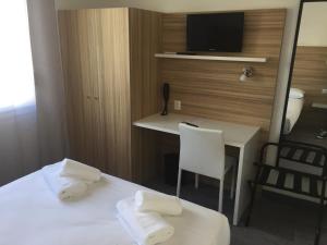 Hotels L'Oasis : photos des chambres