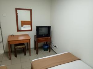 Triple Room with Shared Bathroom room in Hotel Hibiscus City (PUDU)