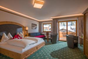 Deluxe Double Room (2 Adults + 1 Child) room in Hotel Bichlingerhof