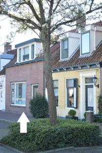 Sfeervol ingericht vakantiehuis in hartje Kortgene, dichtbij Veerse Meer - Ubytování bez kategorie ve městě Kortgene