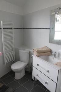 Appartements Le Presbytere : photos des chambres