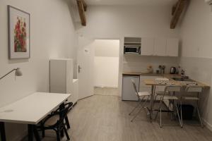 Appartements Le Presbytere : photos des chambres