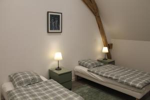 Appartements Le Presbytere : photos des chambres