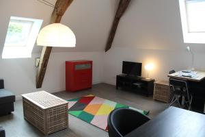 Appartements Le Presbytere : photos des chambres