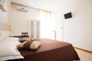 Superior Triple Room with Terrace room in Hotel Indipendenza