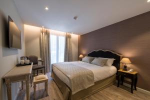 Hotels Nouvel Hotel du Commerce : photos des chambres