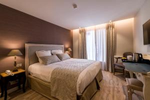 Hotels Nouvel Hotel du Commerce : photos des chambres