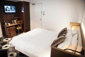 Hotels The Originals Boutique, Hotel Bulles by Forgeron, Lille Sud (Qualys-Hotel) : photos des chambres