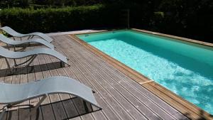 Maisons de vacances Le Clos du Loup : photos des chambres