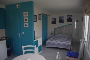 Appartements Studio rez-de-jardin : photos des chambres