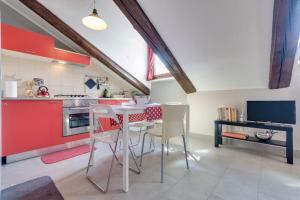 Accogliente mansarda a Porta Nuova