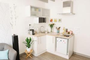 Appartements La Suite aquitaine : photos des chambres