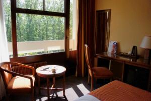 Hotels Le Grand Monarque : photos des chambres