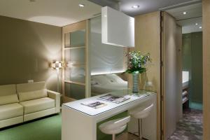 Suite with Kitchenette room in Ako Suites Hotel