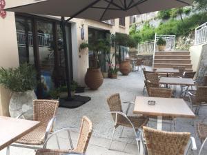 Hotels Hotel du Tourisme : photos des chambres