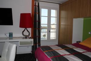 Hotels Les Colonnes : photos des chambres