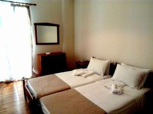 Two-Bedroom Apartment room in Achillion Apartment