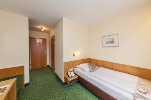 Economy Single Room room in Novum Hotel Strohgäu