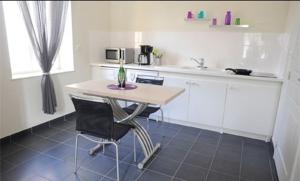 Appartements Aux Jardins de L'Isle : photos des chambres