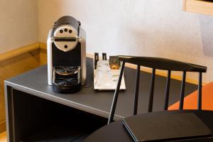 Hotels Hotel Le Colombier Suites : photos des chambres
