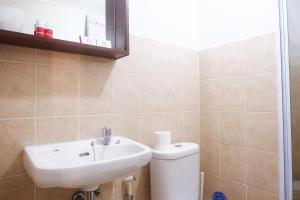 2BR Cozy at Green Bay Pluit Apartment Baywalk By Travelio