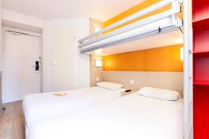 Hotels Premiere Classe Valenciennes Ouest Petite Foret : photos des chambres