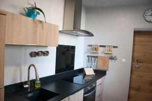 Appartements Appartement Du Fau De La Roque : photos des chambres