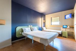 Hotels ibis budget Amberieu en Bugey/Chateau Gaillard A42 : photos des chambres