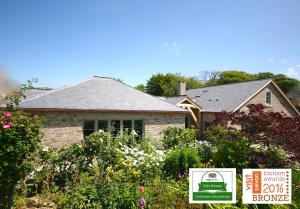 Putsborough Manor 3 Self Catering Cottages with Beach a short walk, dog friendlyyear, On site Tennis, Play Area, Paddock, Spa baths, BBQ, Private Gardens, Superfast WIFI