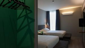 Queen Room with Two Queen Beds room in G Hotel Pescara
