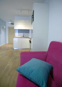 Turquoise and Magenta Apartaments