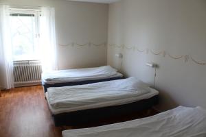 Triple Room with Shared Bathroom room in Ekbackens Vandrarhem