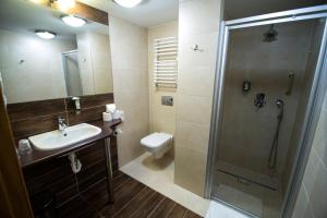 Deluxe Triple Room room in Hotel Biathlon Sport & Spa
