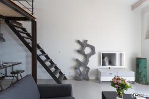 Appartements La Suite de la Maison du Village : photos des chambres