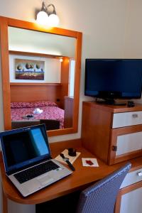 Standard Quadruple Room with Balcony