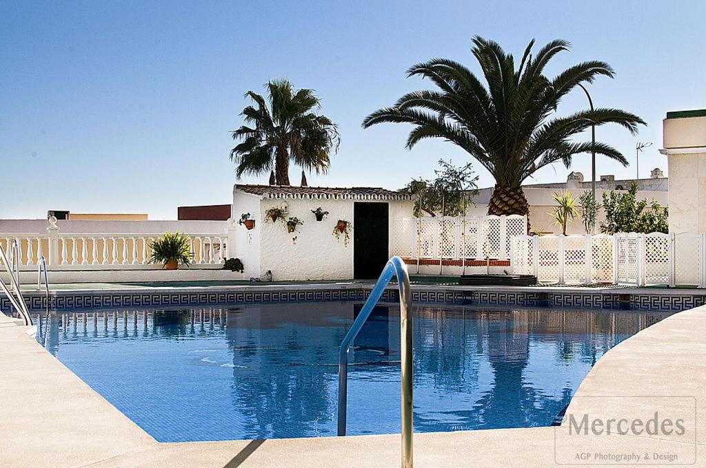 Beautiful Apartment with Balcony and pool. Images