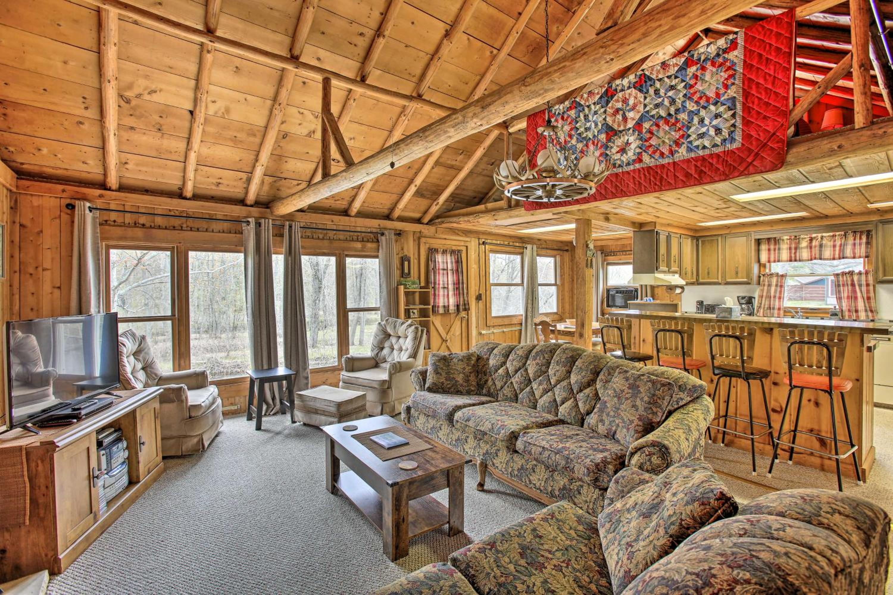 Rustic River View Cabin with Fire Pit, Games and Grill Images