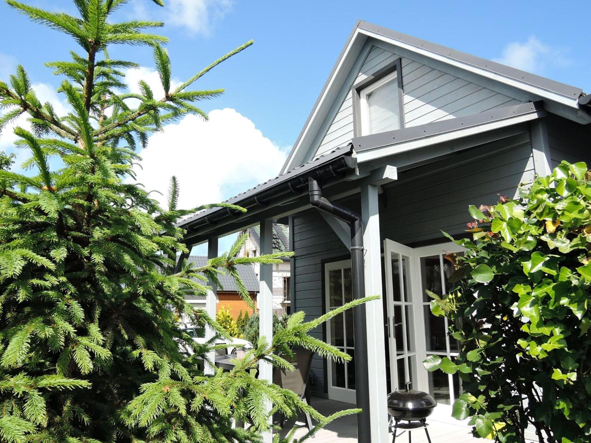 Holiday home in a holiday park in Rewal with a terrace Images