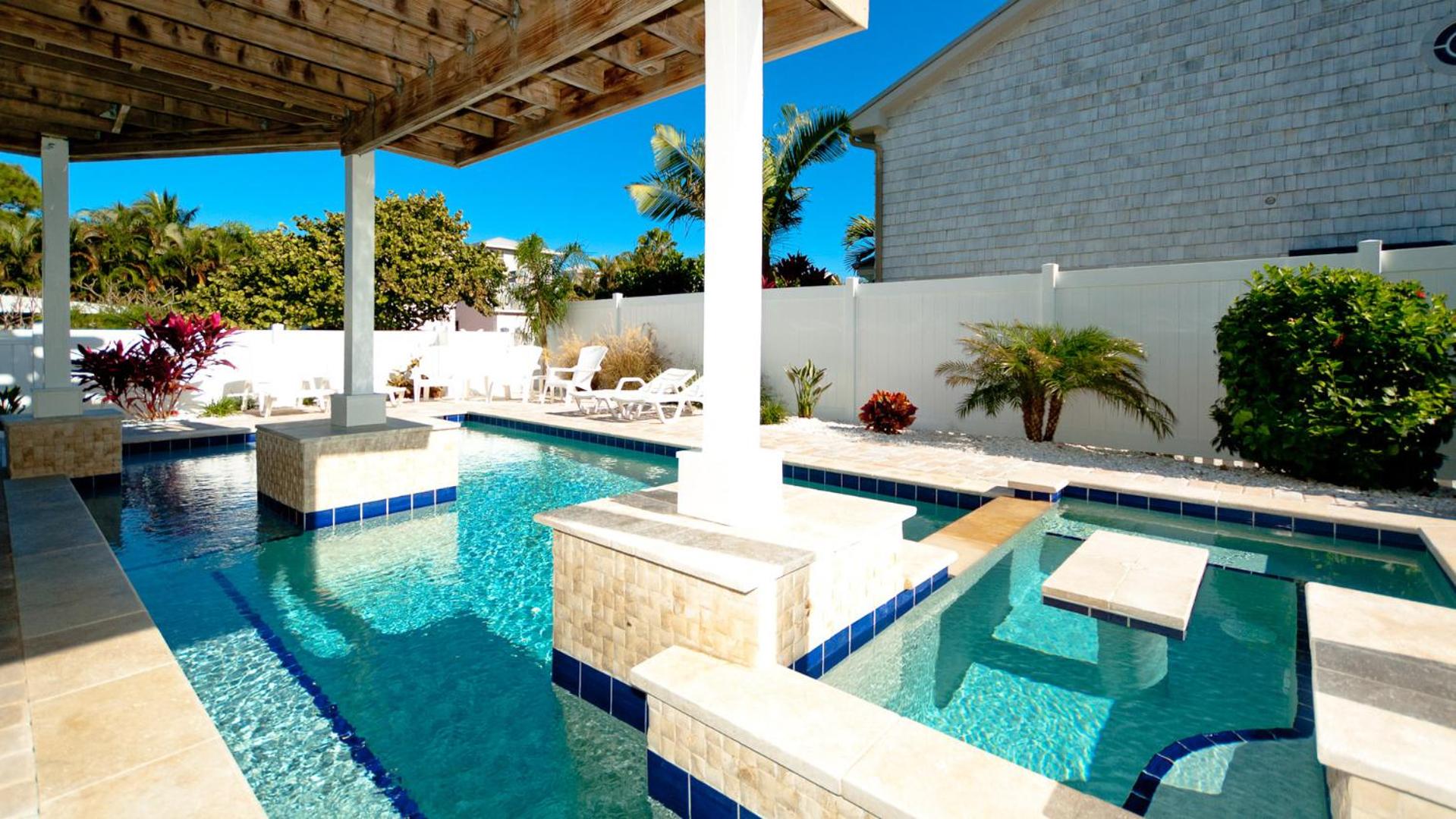 AMI Retreat: 200 Steps to Beach, Dog Friendly Pool Home by Anna Maria Life Vacation Rentals
