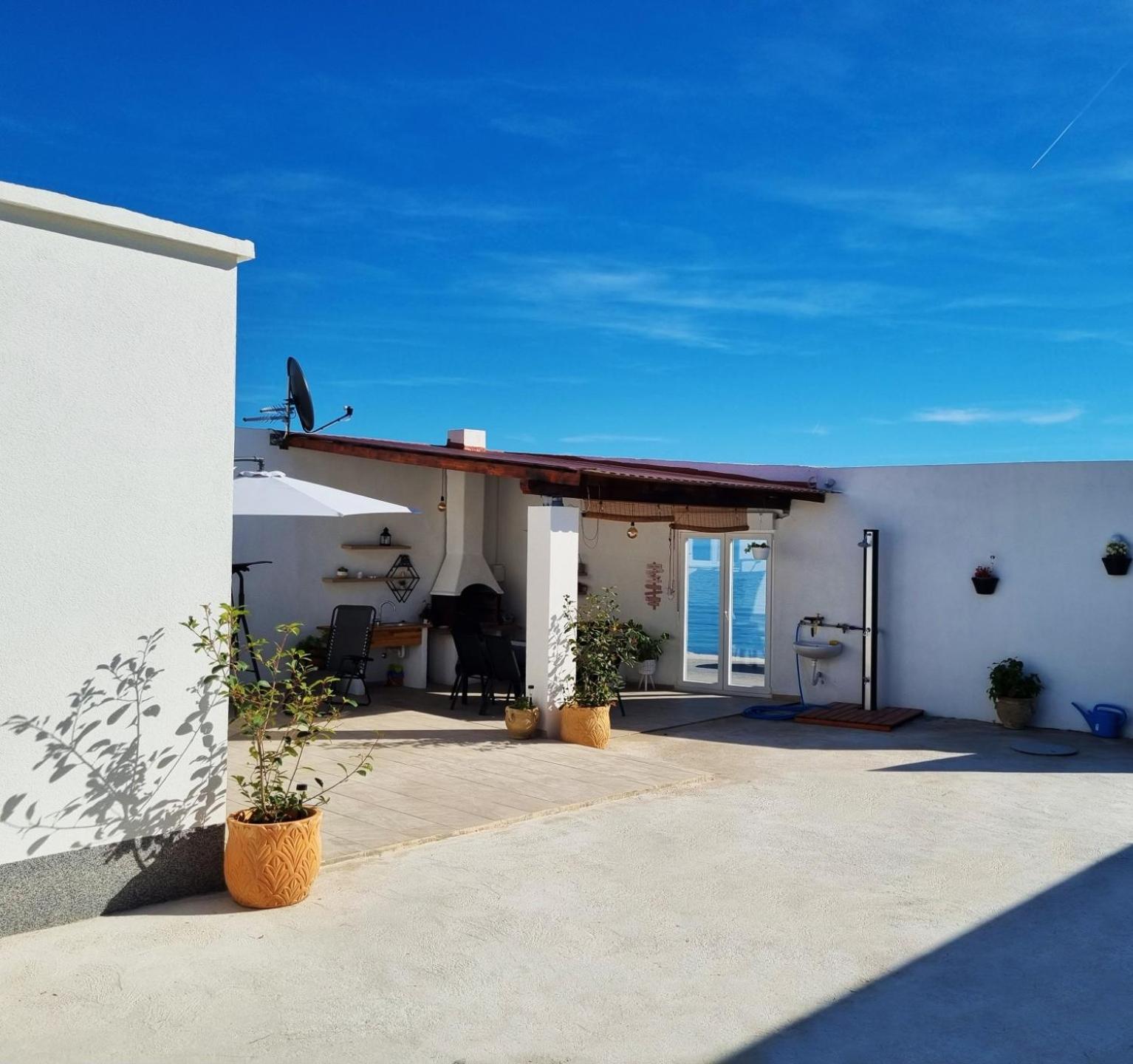Intimate beachfront house Villa Livak Images