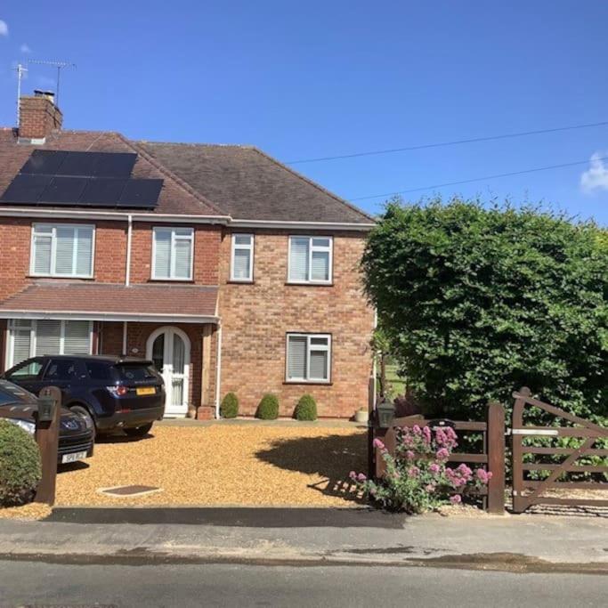 Cotswold edge guest suite with Broadway Hill view Images