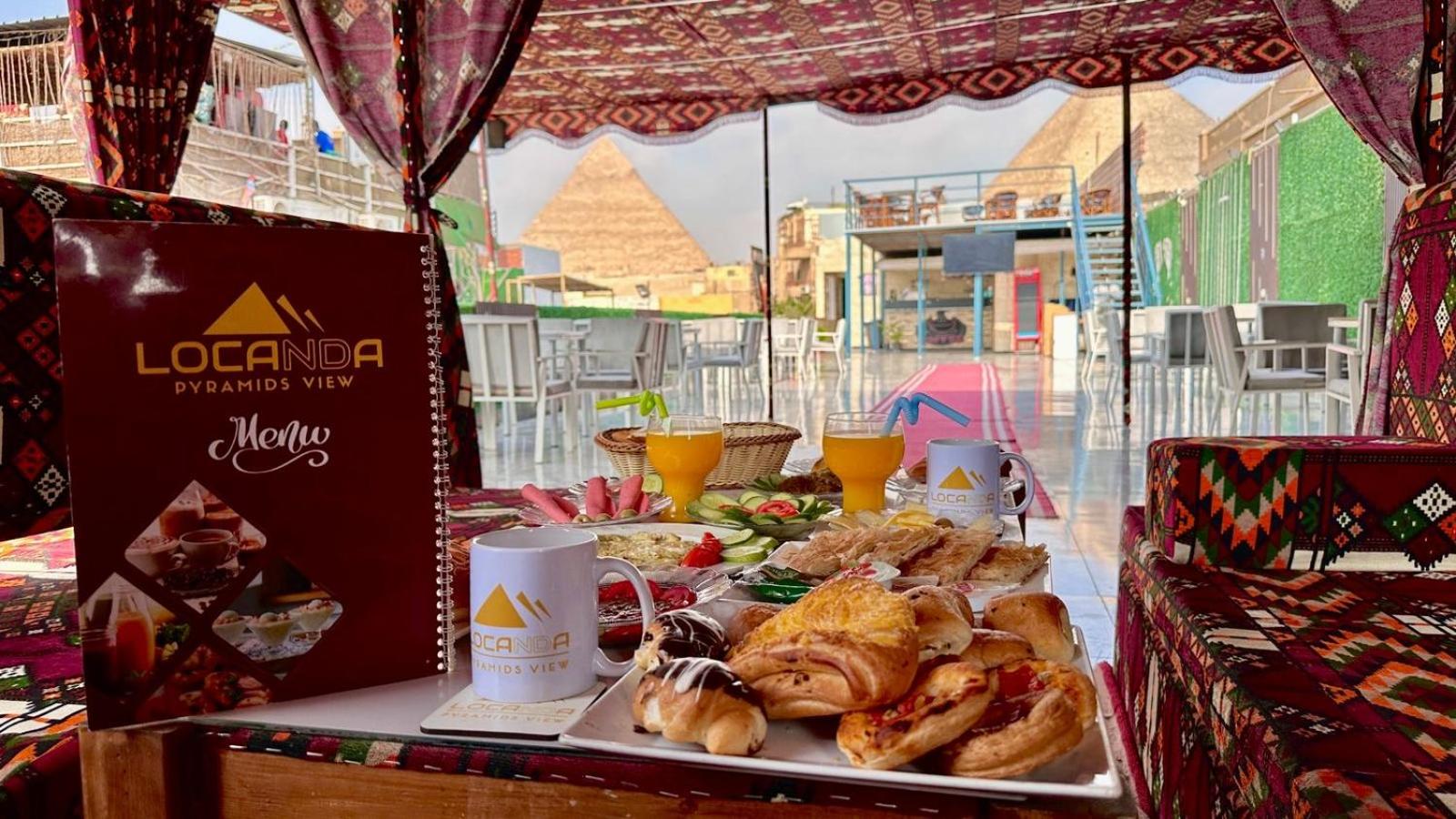 Locanda view pyramids in