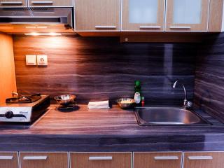 Simply 1BR Scientia Residence Apartement near Summarecon Mall Gading Serpong By Travelio - 4