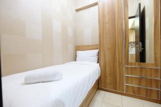 Minimalist 2BR Serpong Greenview Apartment By Travelio - 8