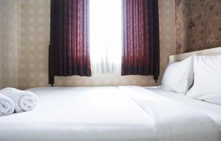 Pool View 2BR Mutiara Bekasi Apartment By Travelio - Bekasi - 4
